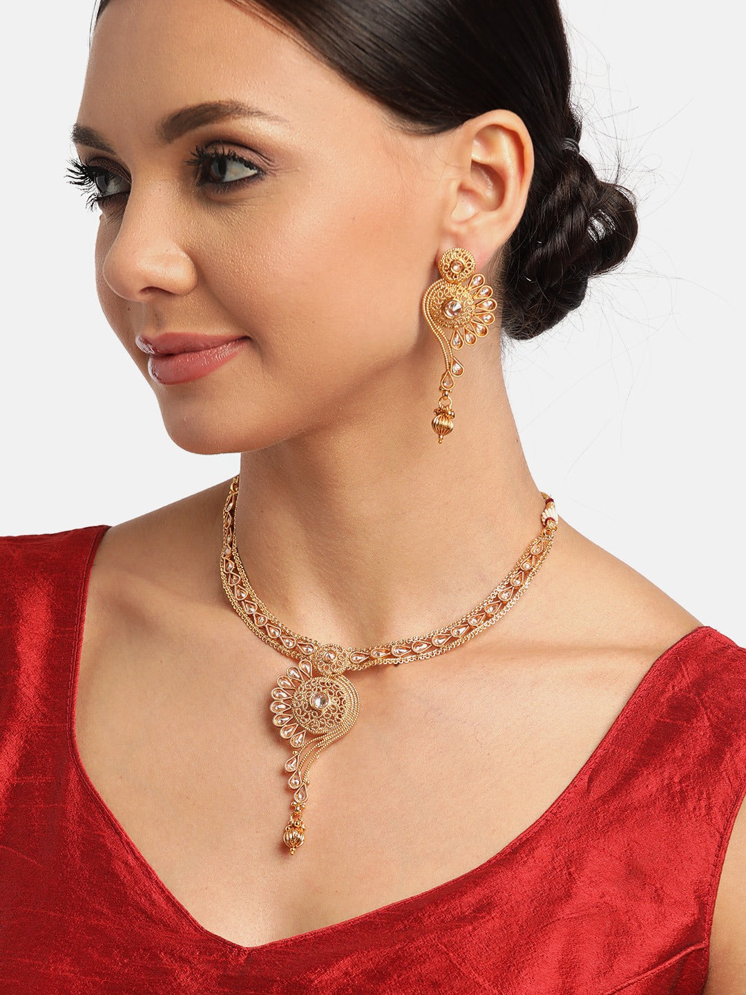 Women Gold-Plated Stone Studded Handcrafted Jewellery Set
