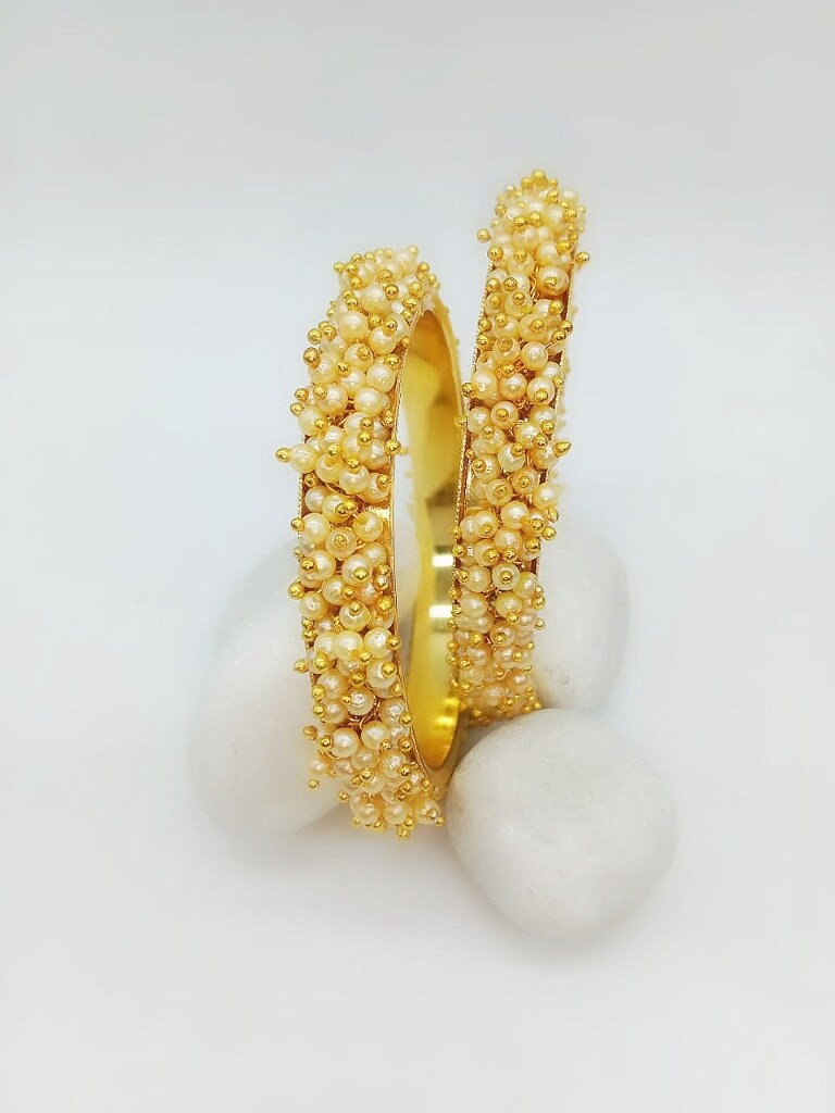 White Beads Studded Golden Bangles