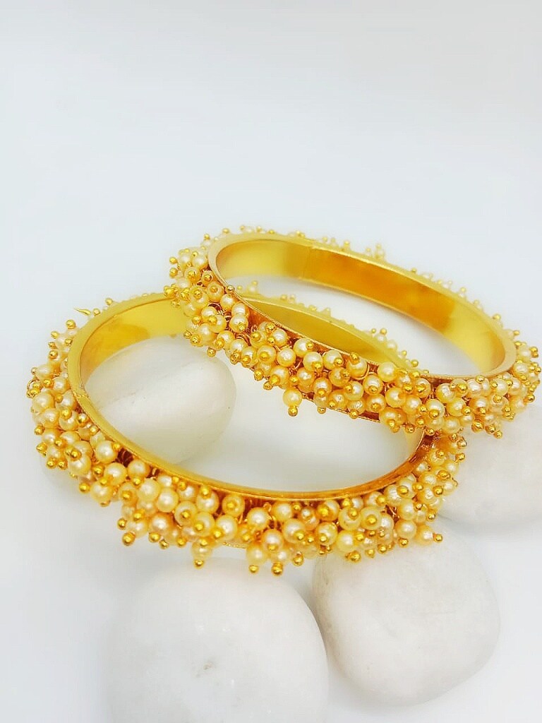 White Beads Studded Golden Bangles