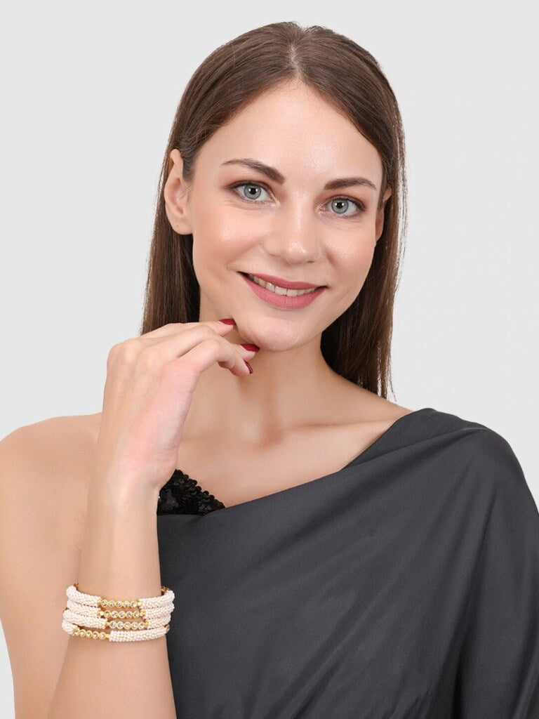 Set of 4 Gold Plated & White Pearl and Stone Studded Handcrafted Bangles`