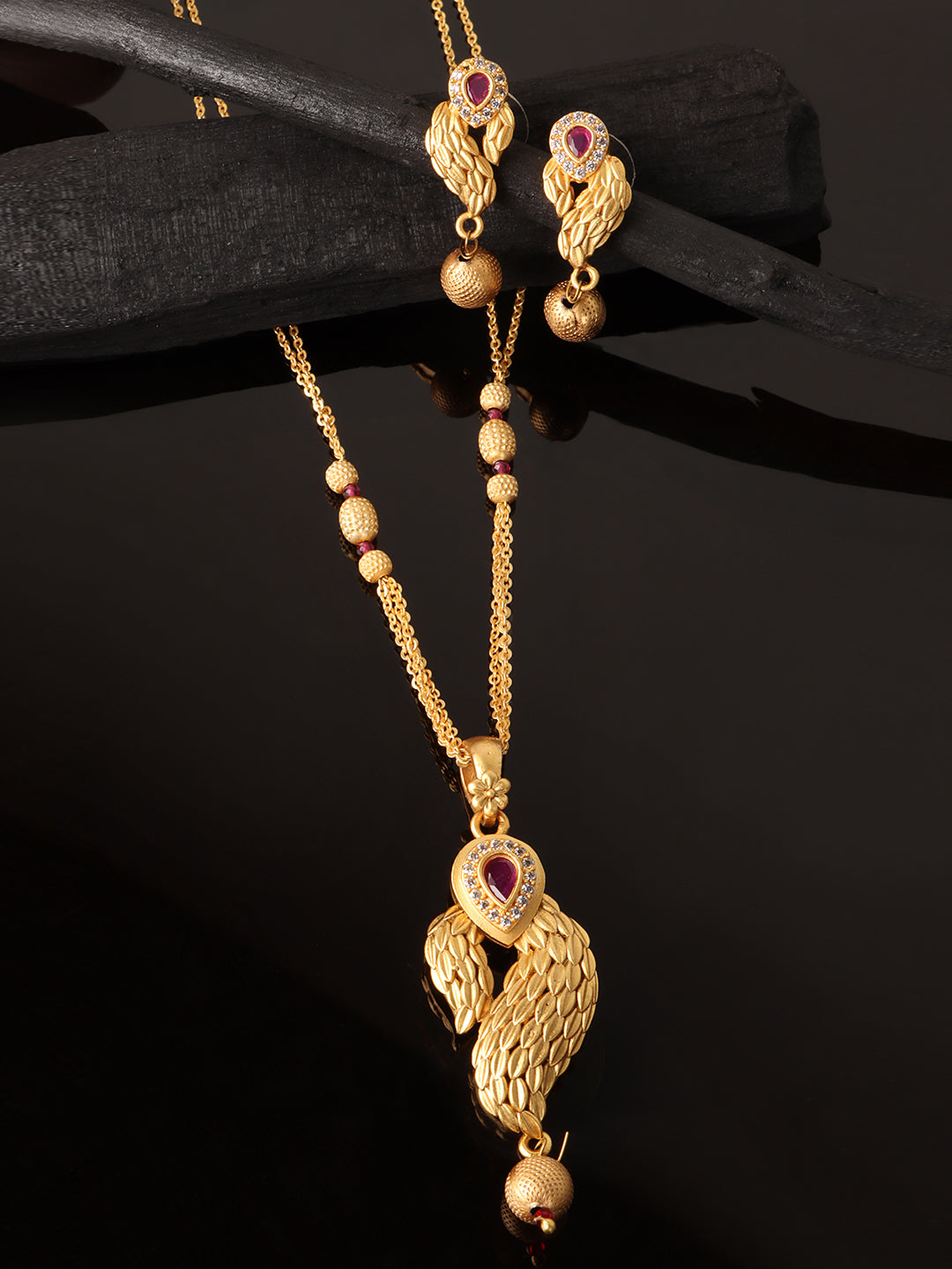 Gold Pink Stone Studded Jewellery Set