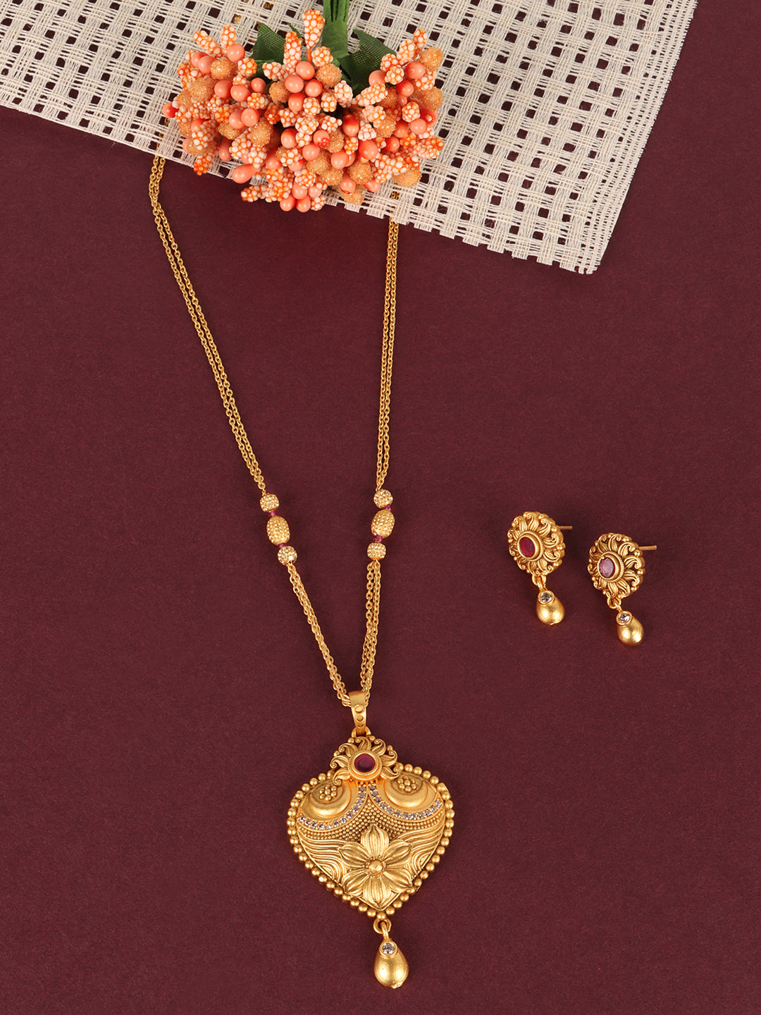 Gold-Plated Pink Stone Studded Traditional style Jewellery Set