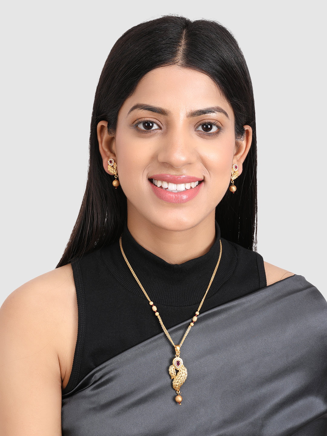 Gold Pink Stone Studded Jewellery Set