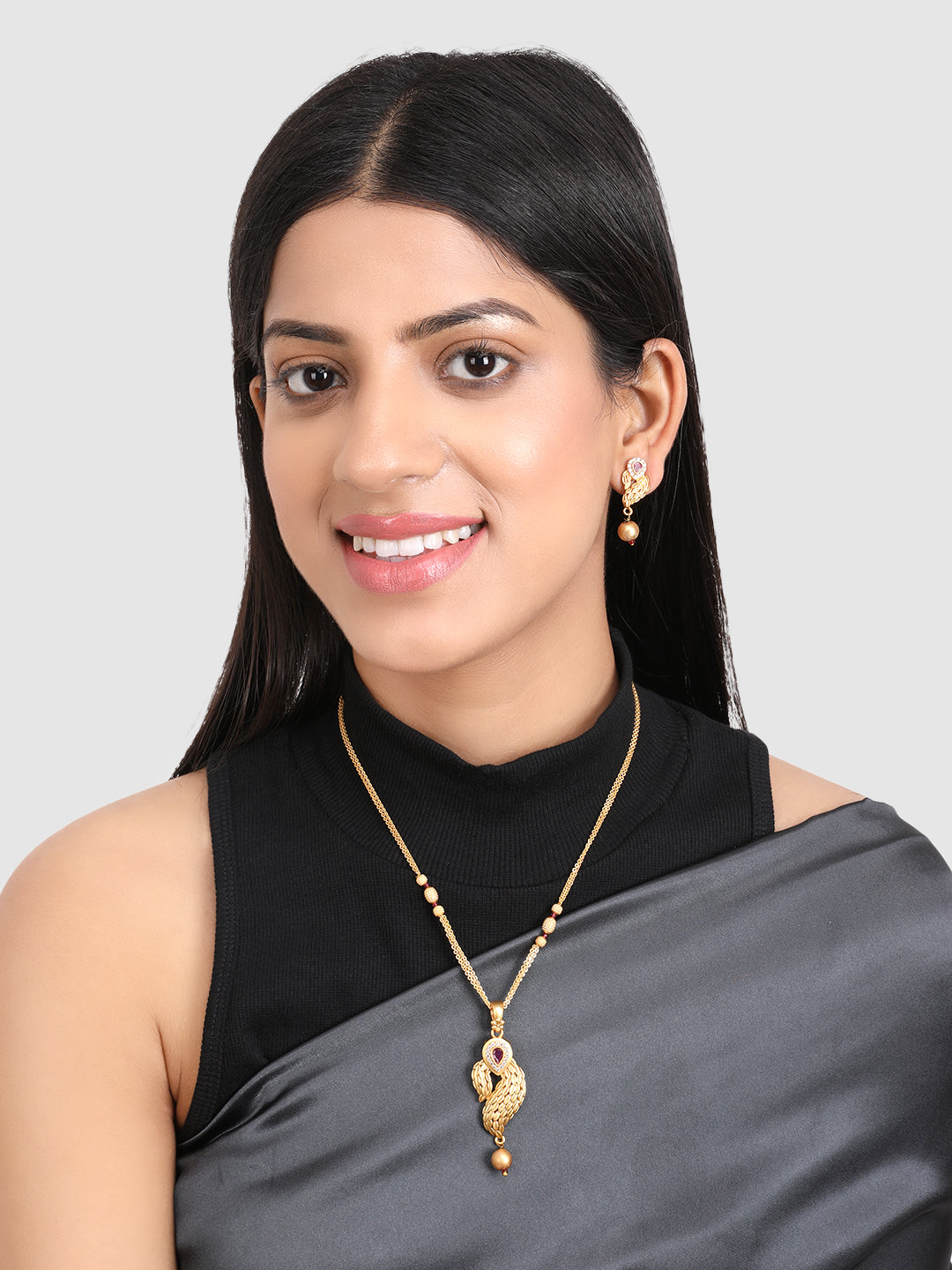 Gold Pink Stone Studded Jewellery Set