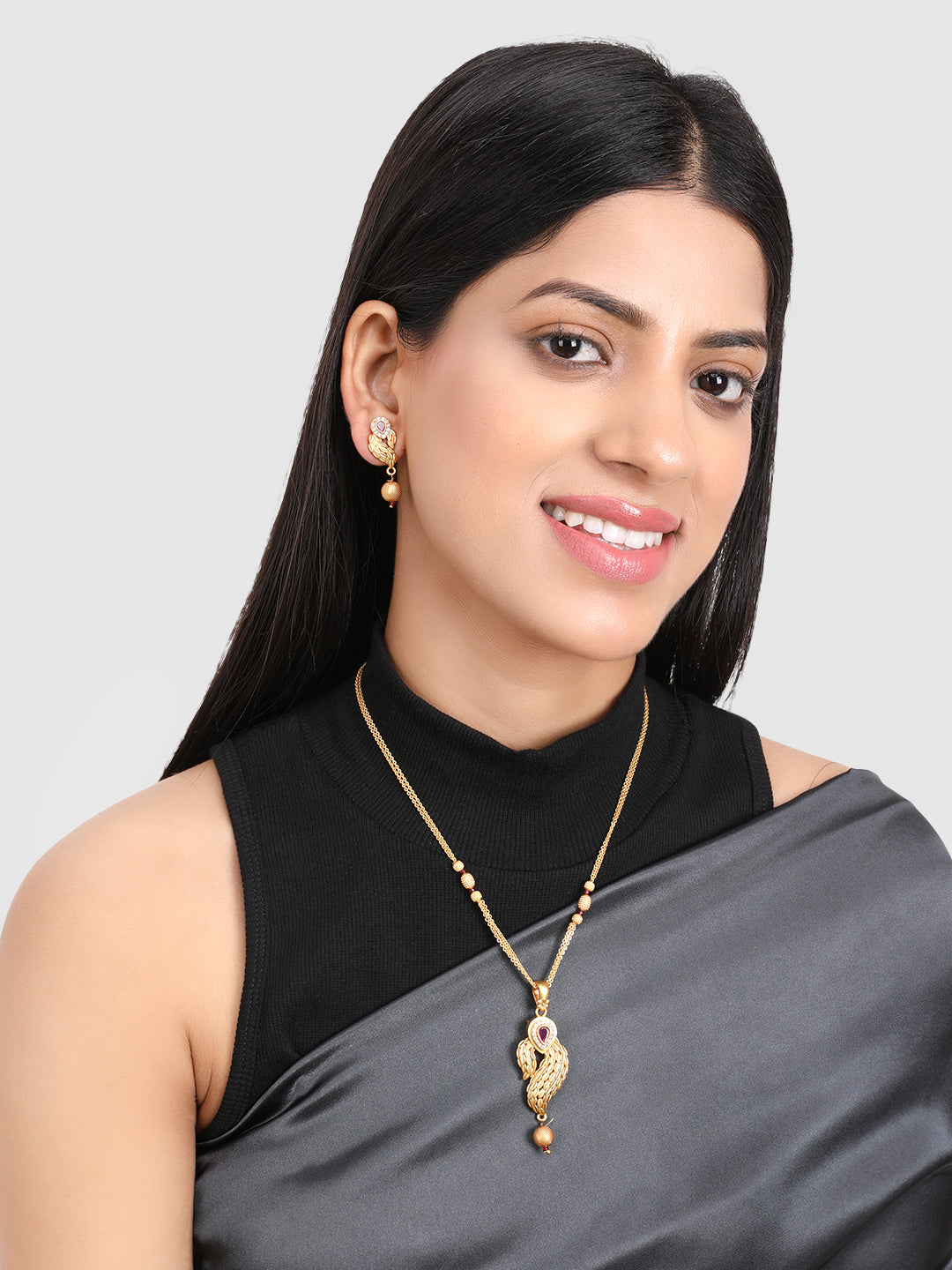 Gold Pink Stone Studded Jewellery Set
