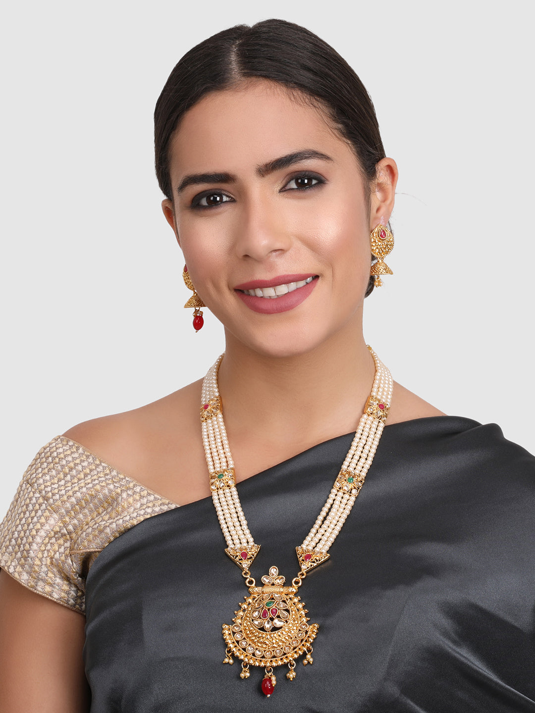 Gold Plated Off White Pearl String AD Studded Jewellery Set