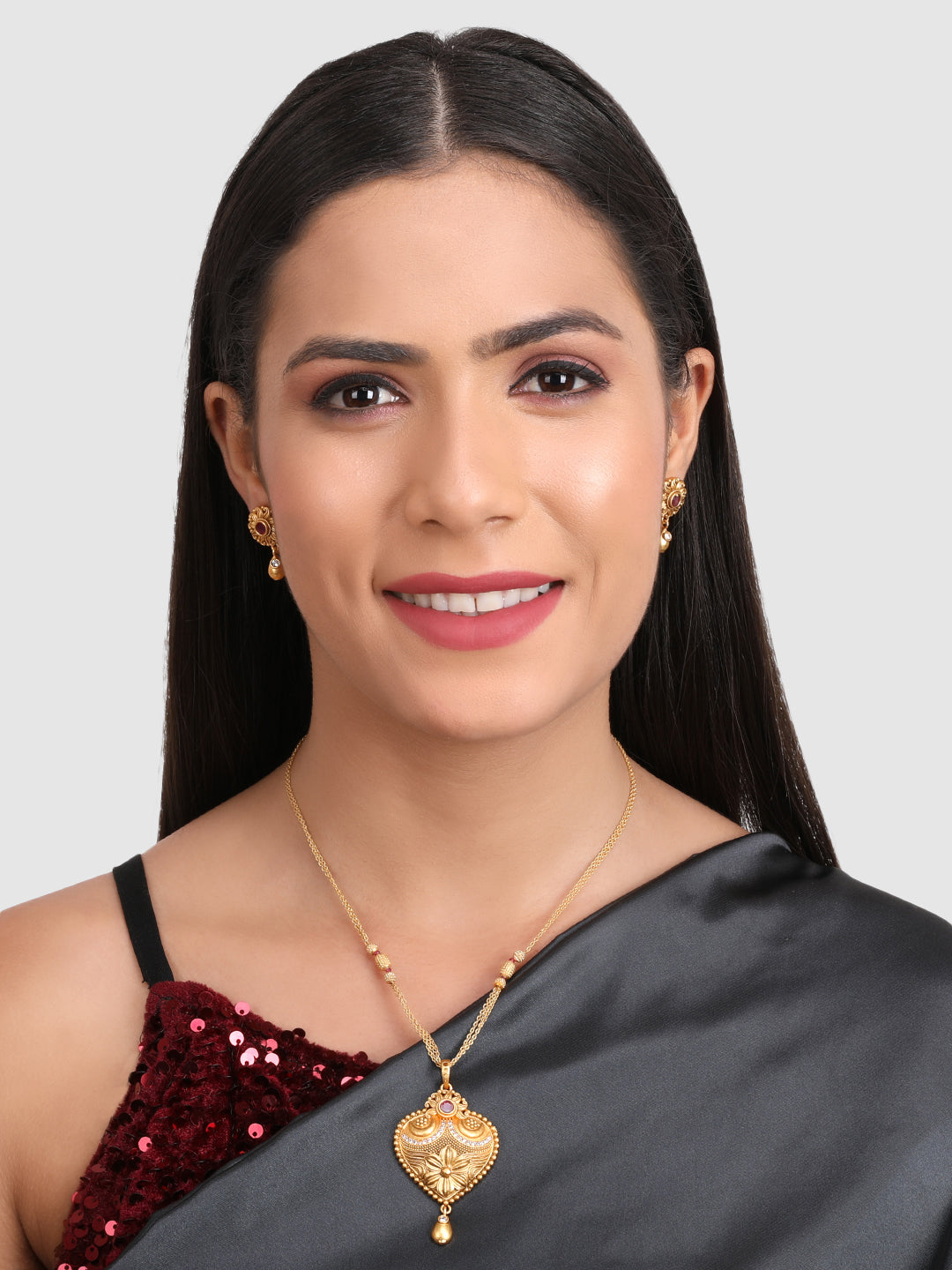 Gold-Plated Pink Stone Studded Traditional style Jewellery Set