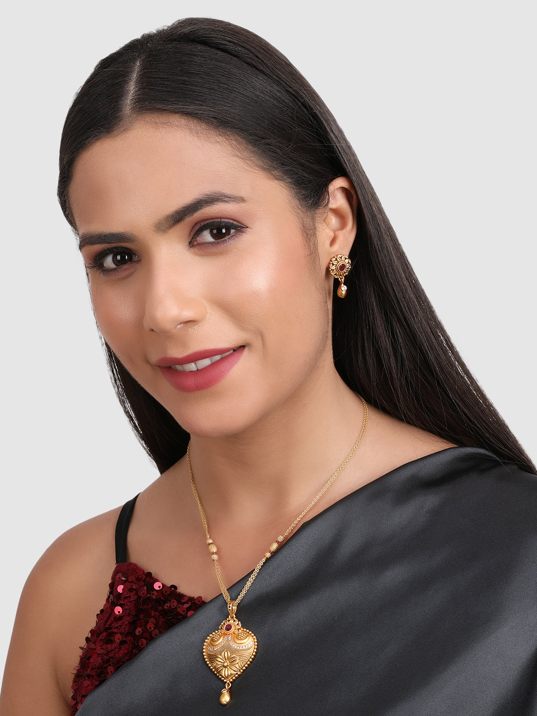 Gold-Plated Pink Stone Studded Traditional style Jewellery Set
