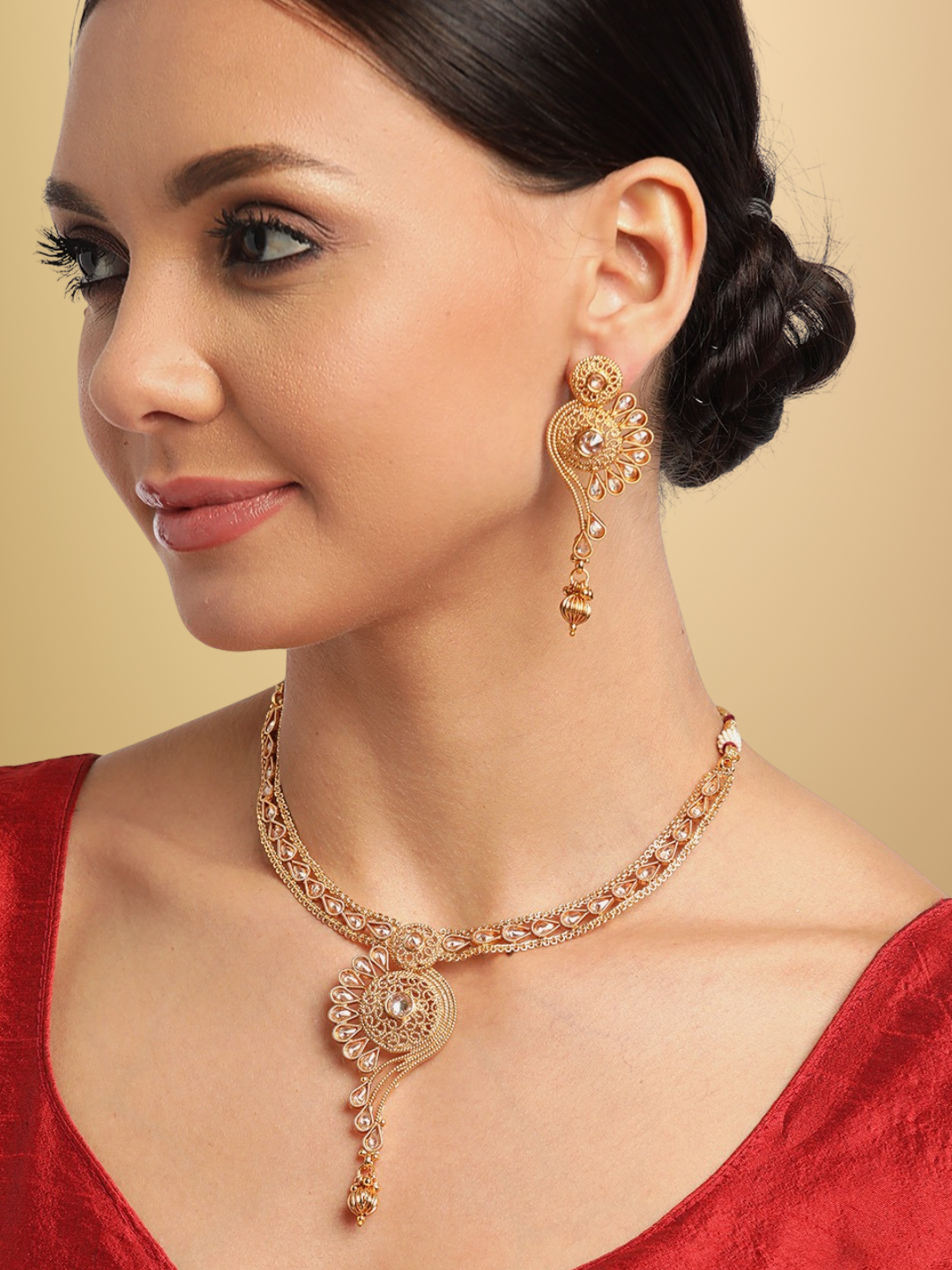 Women Gold-Plated Stone Studded Handcrafted Jewellery Set