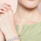 Women Silver- Plated AD Stone Studded Handcrafted Bangle Style Bracelet