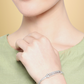 Women Silver- Plated AD Stone Studded Handcrafted Bangle Style Bracelet