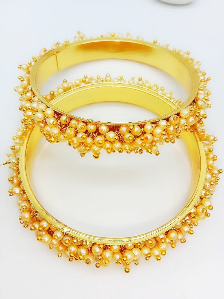 White Beads Studded Golden Bangles