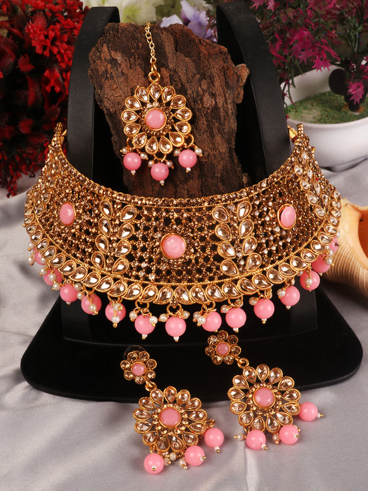 Woman Pink &Gold Plated Studded Choker Set with Floral Earring & Maangtika