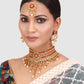 Gold Plated Floral Red Stone Studded Choker Set with Earrings & Maangtika
