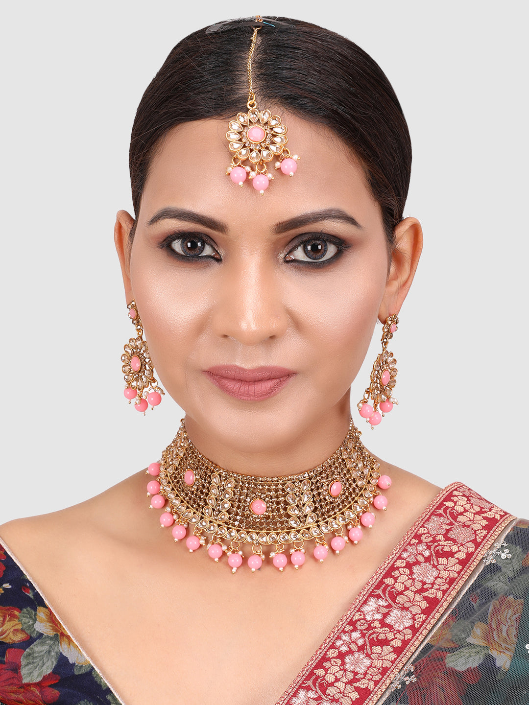 Woman Pink &Gold Plated Studded Choker Set with Floral Earring & Maangtika