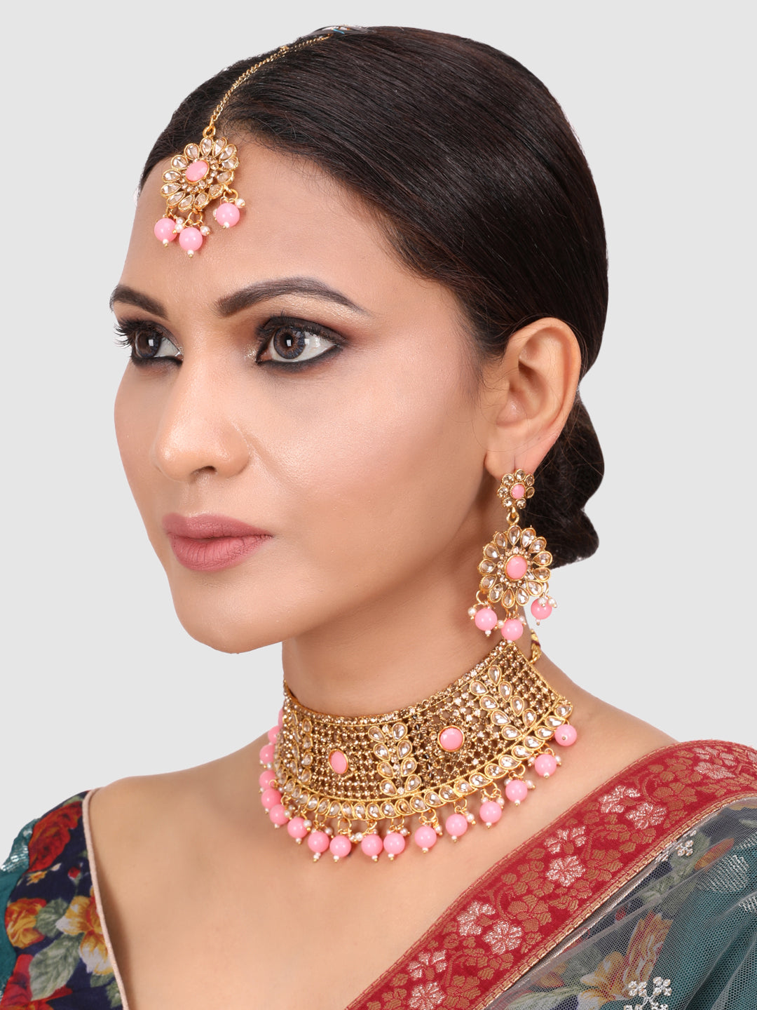 Woman Pink &Gold Plated Studded Choker Set with Floral Earring & Maangtika